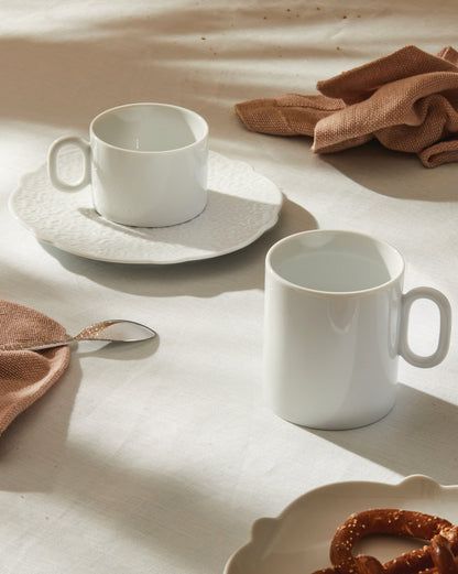 Dressed: Saucer for teacup 4 pieces By Marcel Wanders | ALESSI