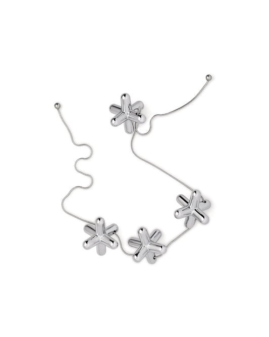 Tripod Trivet With Adjustable Elements by Gabriele Chiave | ALESSI
