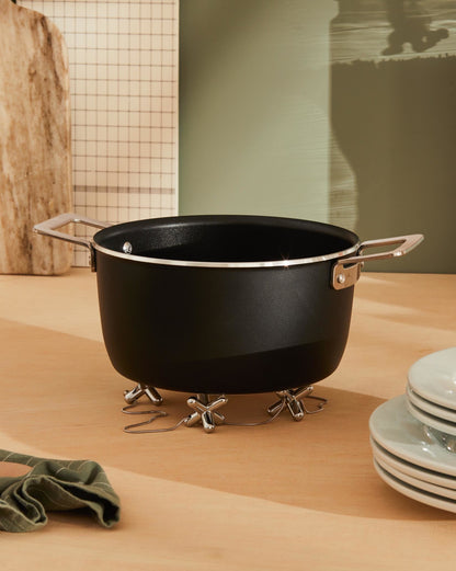 Tripod Trivet With Adjustable Elements by Gabriele Chiave | ALESSI