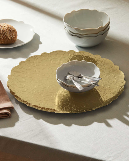 Dressed: Decorated Round Tray in Gold-Finish Steel | ALESSI